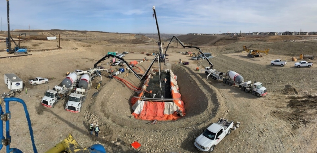 Looking north at the concrete pour; the Paskapoo Slope is visible in the background