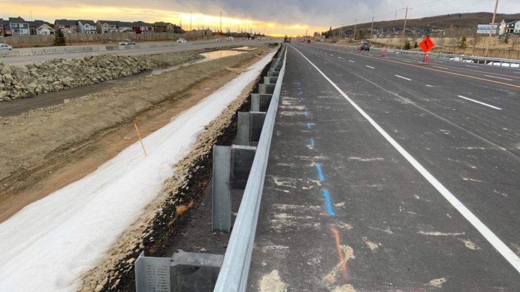 Looking east at guardrail installation for the westbound lanes 